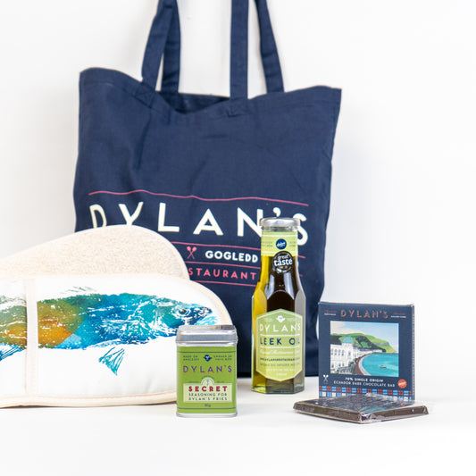 Dylan's products including a tote bag, bottle, and other items on a white background