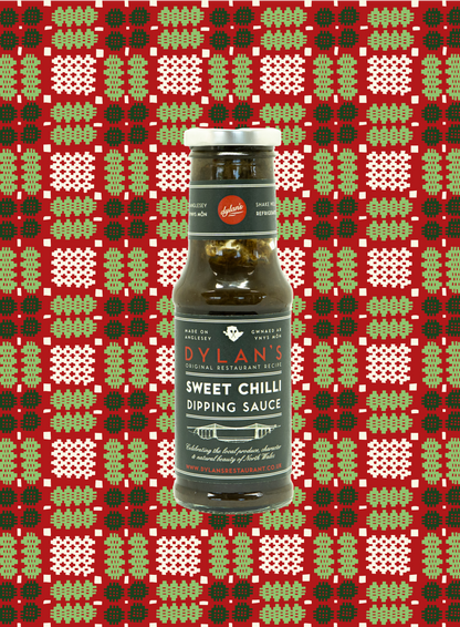 Bottle of Dylan's Sweet Chilli Dipping Sauce on a patterned background